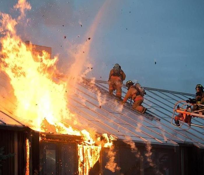 Firefighters at a house fire.