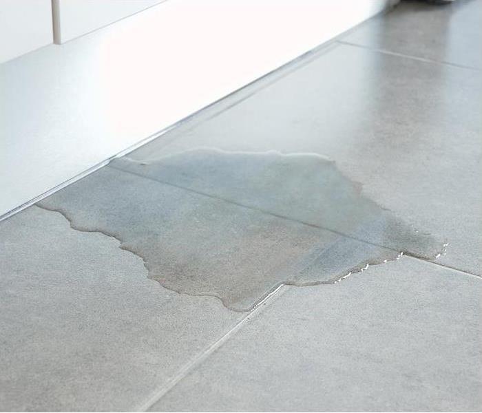 water damage all over a kitchen floor