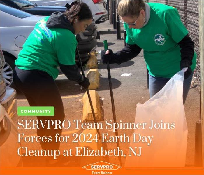 SERVPRO Team Spinner volunteers picking up trash in a parking lot